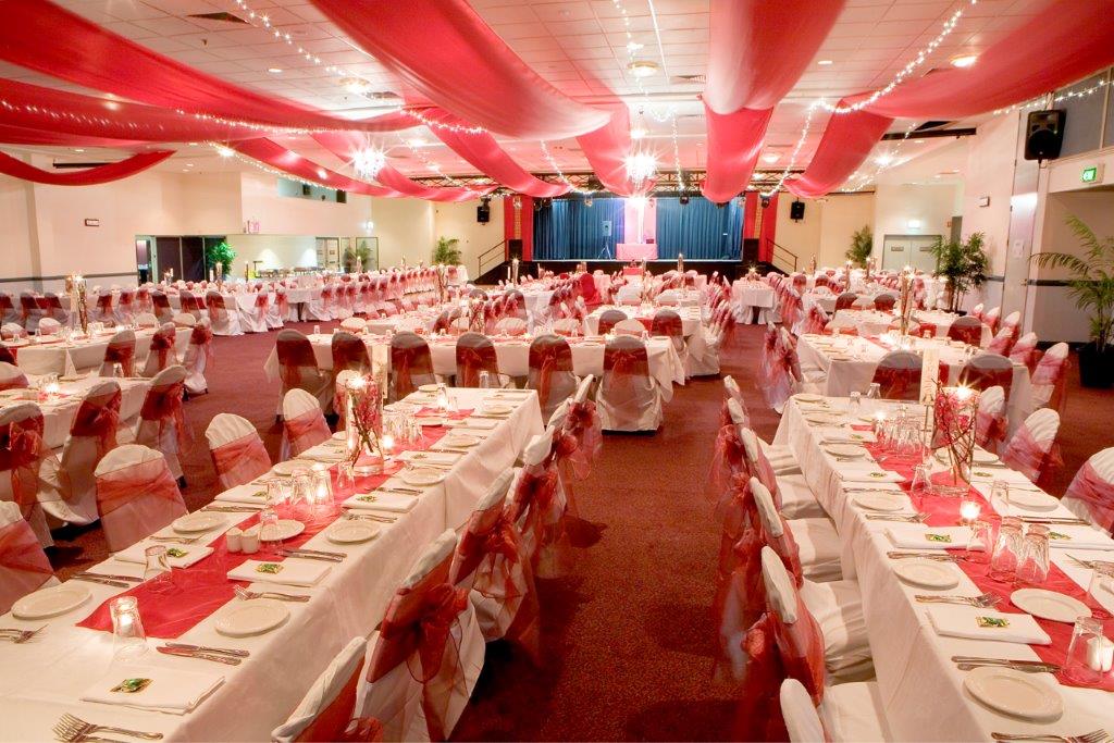 Marquee ceiling canopy white silks, purple bows long tables - Cex