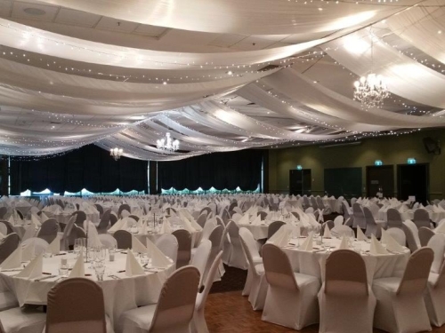 Marquee ceiling canopy white silks, crystal chandeliers - Grand Auditorium