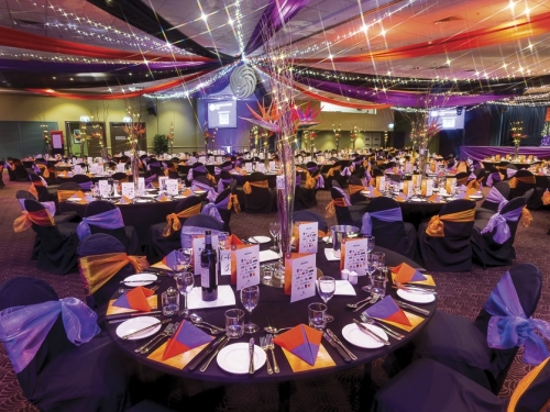 Star ceiling canopy orange black purple, bird of paradise centre table decoration Coffs Harbour Chamber of Commerce Business Awards Cex