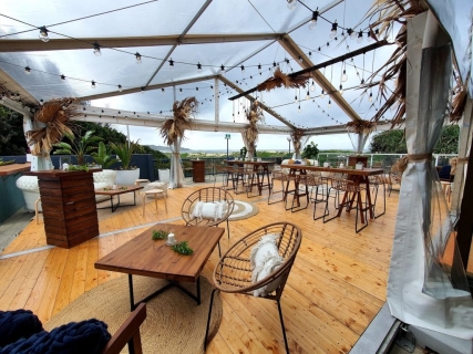 Marquee by the beach dried botanical floral arrangements cocktail style