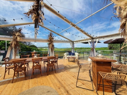 Marquee by the beach dried botanical floral arrangements cocktail style