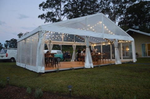 Marquee ceiling canopy marquee festoon brown Hampton chairs