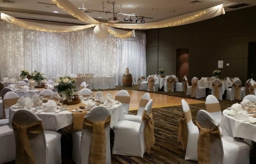 Star ceiling canopy chair covers burlap bows Pacific Bay Resort