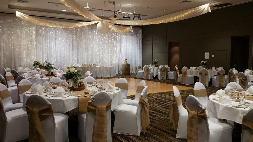 Star ceiling canopy chair covers burlap bows Pacific Bay Resort