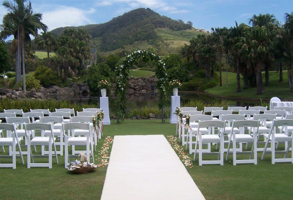 Wedding ceremony Betting tee, fiscus arbour, white pillars, white carpet bridal isle Pacific Bay Resort