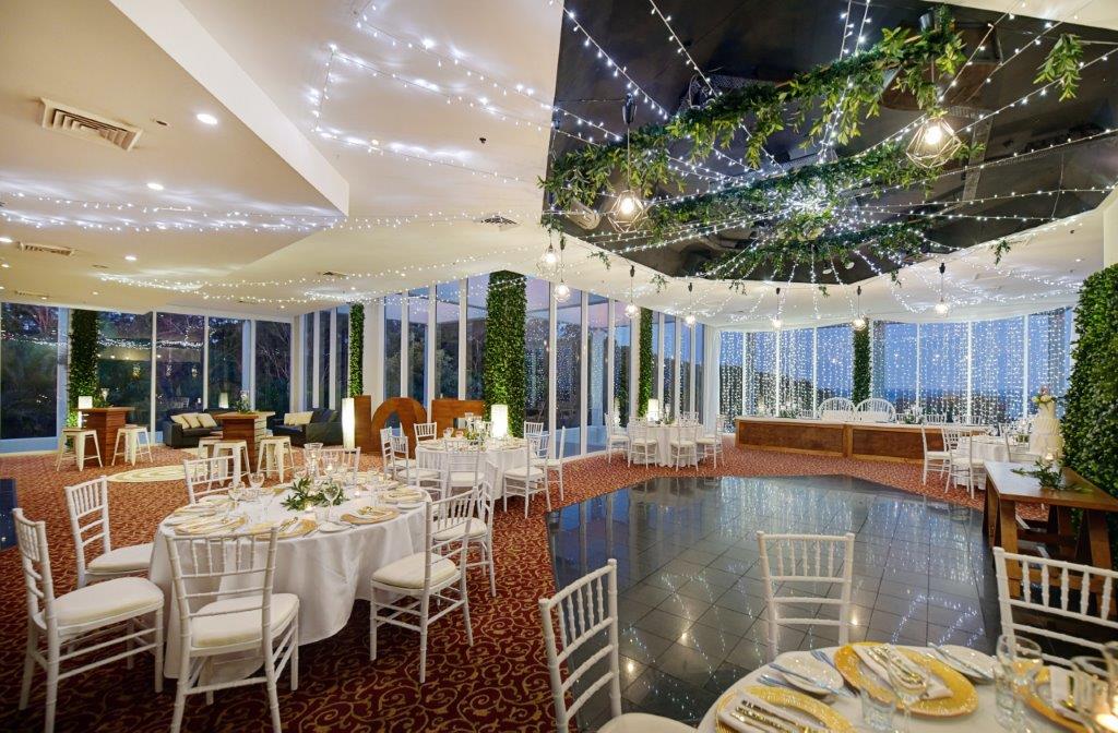 Pendent lights lattice greenery Tiffany chairs Opals Room