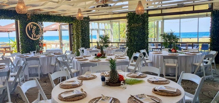 Backdrop 3 Forest Greenery Door Framing , Malibu chairs, Pineapple table decoration, MR & MRS Sign