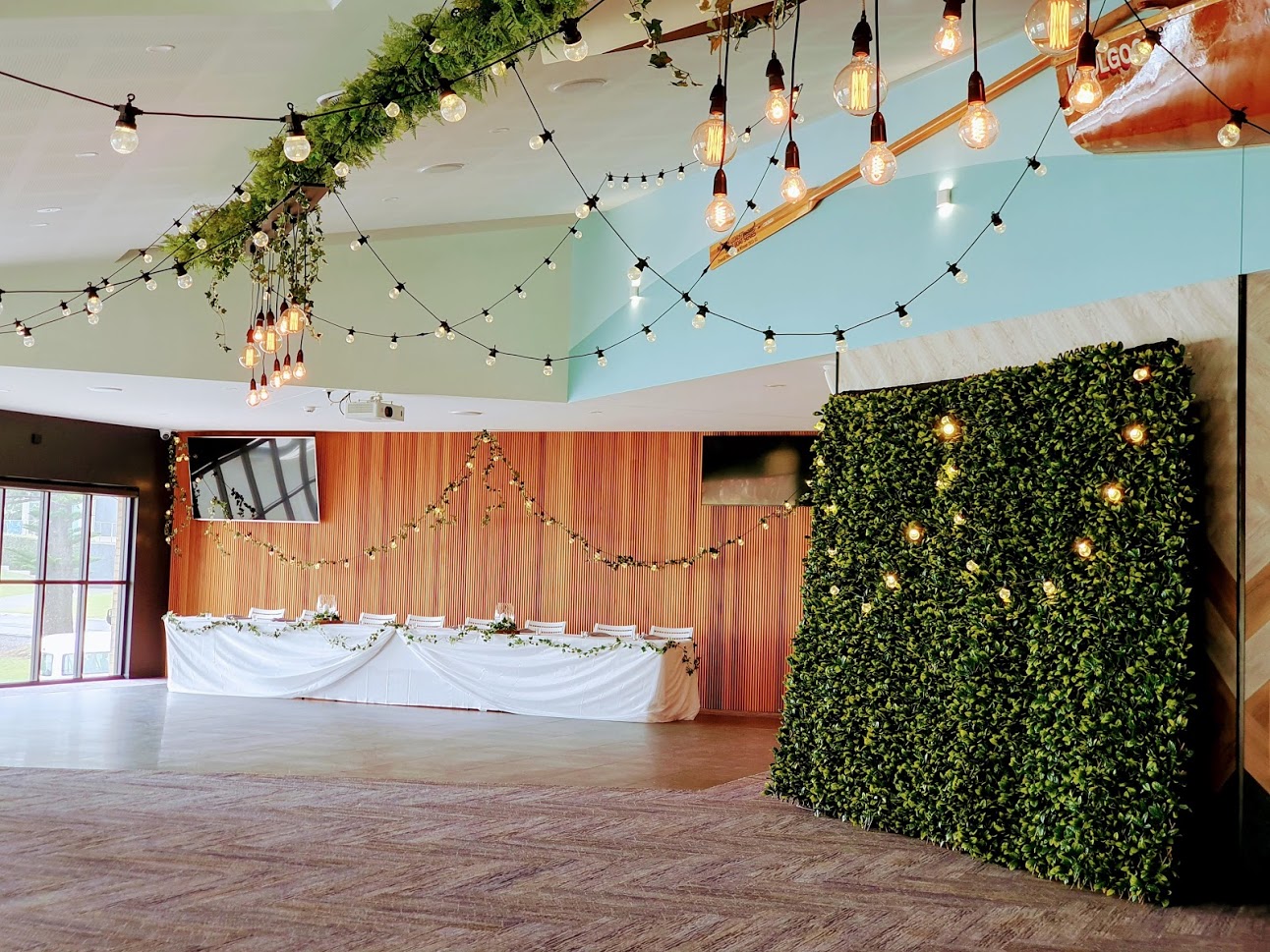 Woolgoolga surf ceiling festoon, bridal table, photo booth greenery