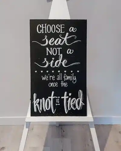 Sign Black Choose a seat + white easel